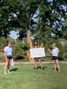 Three campers wear masks while participating in a game at Camp Therapyology. We offer summer programs for teens in West Bloomfield, MI. Contact us to learn more about how summer camp can help your teen thrive!